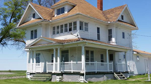 Side View of Farmhouse with $75K Remodel