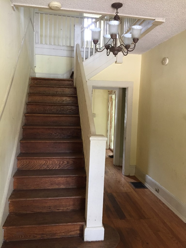 Open Stairway at Entry Foyer in Colonial Revival